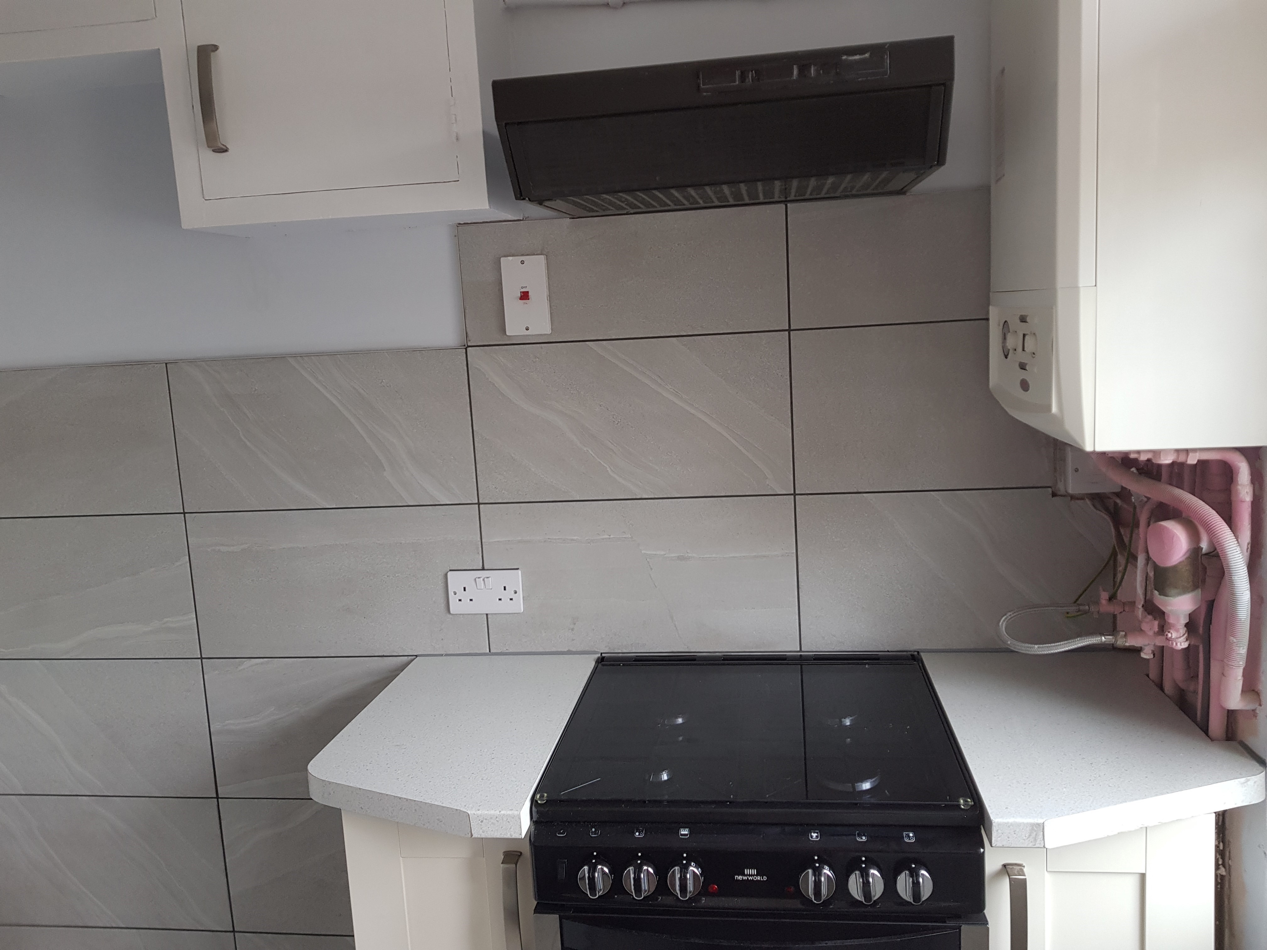 A small kitchen with modified cabinets